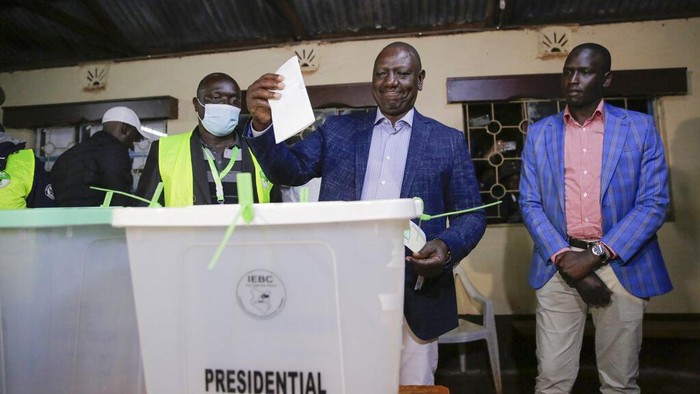 Deputy President and presidential candidate William Ruto leaves after casting his vote in Kenyas general election in Sugoi, 50 kms (35 miles) north west of Eldoret, Kenya, Tuesday Aug. 9, 2022. Kenyans are voting to choose between opposition leader Raila Odinga and Ruto to succeed President Uhuru Kenyatta after a decade in power. (AP Photo/Brian Inganga)