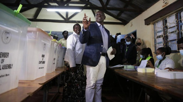 Kenya Elections Deputy President and presidential candidate William Ruto leaves after casting his vote in Kenya's general election in Sugoi, 50 kms (35 miles) north west of Eldoret, Kenya, Tuesday Aug. 9, 2022. Kenyans are voting to choose between opposition leader Raila Odinga and Ruto to succeed President Uhuru Kenyatta after a decade in power. (AP Photo/Brian Inganga)