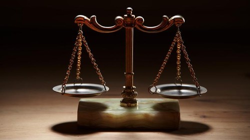 libra scale on the wood background