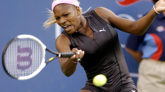 FILE - Serena Williams, of the United States, makes a return to compatriot Lindsay Davenport during their semifinal match at the U.S. Open tennis tournament, Friday, Sept. 6, 2002, in New York. Saying “the countdown has begun,” 23-time Grand Slam champion Serena Williams announced Tuesday, Aug. 9, 2022, she is ready to step away from tennis so she can turn her focus to having another child and her business interests, presaging the end of a career that transcended sports. (AP Photo/Elise Amendola, File)