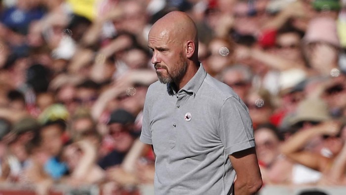 Manchester Uniteds Dutch manager Erik ten Hag looks on during the English Premier League football match between Brentford and Manchester United at Brentford Community Stadium in London on August 13, 2022. - - RESTRICTED TO EDITORIAL USE. No use with unauthorized audio, video, data, fixture lists, club/league logos or live services. Online in-match use limited to 120 images. An additional 40 images may be used in extra time. No video emulation. Social media in-match use limited to 120 images. An additional 40 images may be used in extra time. No use in betting publications, games or single club/league/player publications. (Photo by Ian Kington / AFP) / RESTRICTED TO EDITORIAL USE. No use with unauthorized audio, video, data, fixture lists, club/league logos or live services. Online in-match use limited to 120 images. An additional 40 images may be used in extra time. No video emulation. Social media in-match use limited to 120 images. An additional 40 images may be used in extra time. No use in betting publications, games or single club/league/player publications. / RESTRICTED TO EDITORIAL USE. No use with unauthorized audio, video, data, fixture lists, club/league logos or live services. Online in-match use limited to 120 images. An additional 40 images may be used in extra time. No video emulation. Social media in-match use limited to 120 images. An additional 40 images may be used in extra time. No use in betting publications, games or single club/league/player publications. (Photo by IAN KINGTON/AFP via Getty Images)