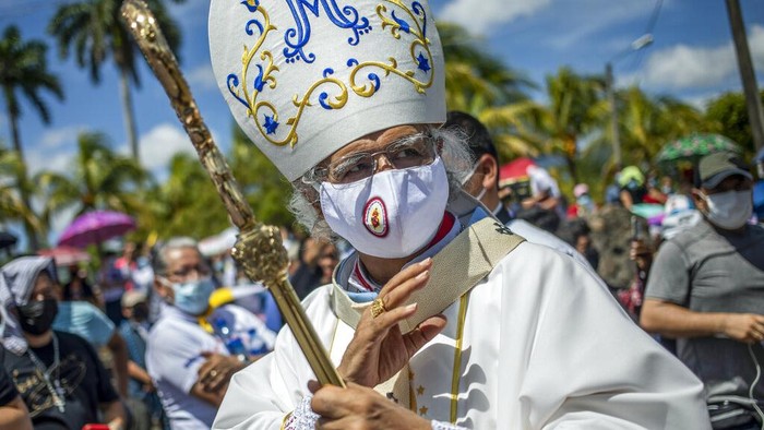 Nicaragua Church Faithful take part in a procession to the Cathedral in Managua, Nicaragua, Saturday, Aug. 13, 2022. The Catholic Church has called on the faithful to peacefully arrive at the Cathedral in Managua Saturday after National Police denied permission for a planned religious procession on