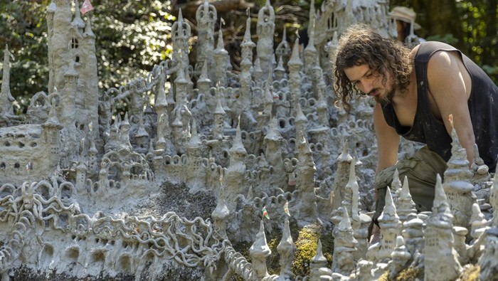 Land art artist Francois Monthoux works on his 
