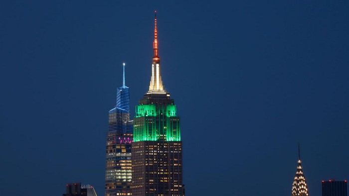 JERSEY CITY, NJ - AUGUST 15: The Empire State Building is lit in the colors of the flag of India, which is marking its 75th year of independence, in New York City on August 15, 2022, as seen from Jersey City, New Jersey.  (Photo by Gary Hershorn/Getty Images)
