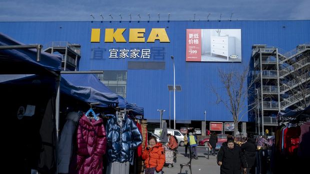 TIANJIN, CHINA - 2022/01/02: On a parking lot under the IKEA store located at the suburb of Tianjin, there is a large weekend bazaar selling farm goods and groceries at low prices and attracting lots of people. At the beginning of 2022,  IKEA, the world's biggest furniture seller,  announced to increase prices by an average of 9%, to offset the rising costs of transportation and raw materials. (Photo by Zhang Peng/LightRocket via Getty Images)