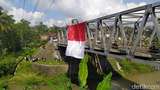 Gagahnya Bendera Merah Putih Raksasa Dibentangkan di Jembatan Canguk Magelang