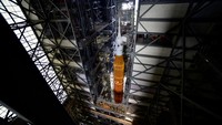 NASAs next-generation moon rocket, the Space Launch System (SLS) Artemis 1 rocket with its Orion crew capsule begins its roll to launch pad 39B at the Kennedy Space Center in Cape Canaveral, Florida, U.S. August 16, 2022. REUTERS/Steve Nesius