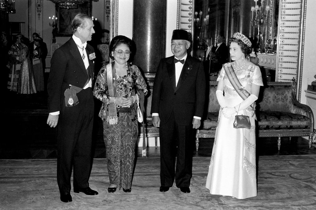 President General Suharto of Indonesia and his wife Madame Tien Suharto, with Queen Elizabeth II and the Duke of Edinburgh at Buckingham Palace before a State banquet in their honour.   (Photo by PA Images via Getty Images)