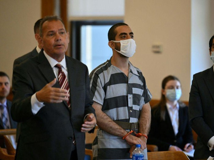 Hadi Matar, the man accused in the attempted murder of British author Salman Rushdie, leaves court after a procedural hearing at Chautauqua County Courthouse in Mayville, New York on August 18, 2022. - Matar has pleaded not guilty to attempted murder charges after being accused of stabbing British author Salman Rushdie multiple times on stage during a literary event at the Chautauqua Institution. The severely injured author is recovering and showing signs of his feisty and defiant self, family and friends said, after the  shocking assault left him on a ventilator with multiple stab wounds on August 12, 2022. (Photo by ANGELA WEISS / AFP) (Photo by ANGELA WEISS/AFP via Getty Images)