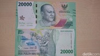 Tampak depan uang kertas Rp 20.000 menampilkan Tokoh Pahlawan Nasional Republik Indonesia Dr. G.S.S.J. Ratulangi sebagai gambar utama. Terdapat lambang negara Garuda Pancasila, gambar kepulauan Indonesia, Bunga Anggrek Hitam, dan beberapa motif khas Indonesia. Bagian belakang menampilkan Tari Gong yang disandingkan dengan keindahan alam Derawan, dipadukan dengan keanggunan Bunga Anggrek Hitam. Desain uang pecahan Rp20.000 bagian belakang diperindah dengan beberapa motif khas Indonesia.Foto: Sylke Febrina Laucereno/detikcom
