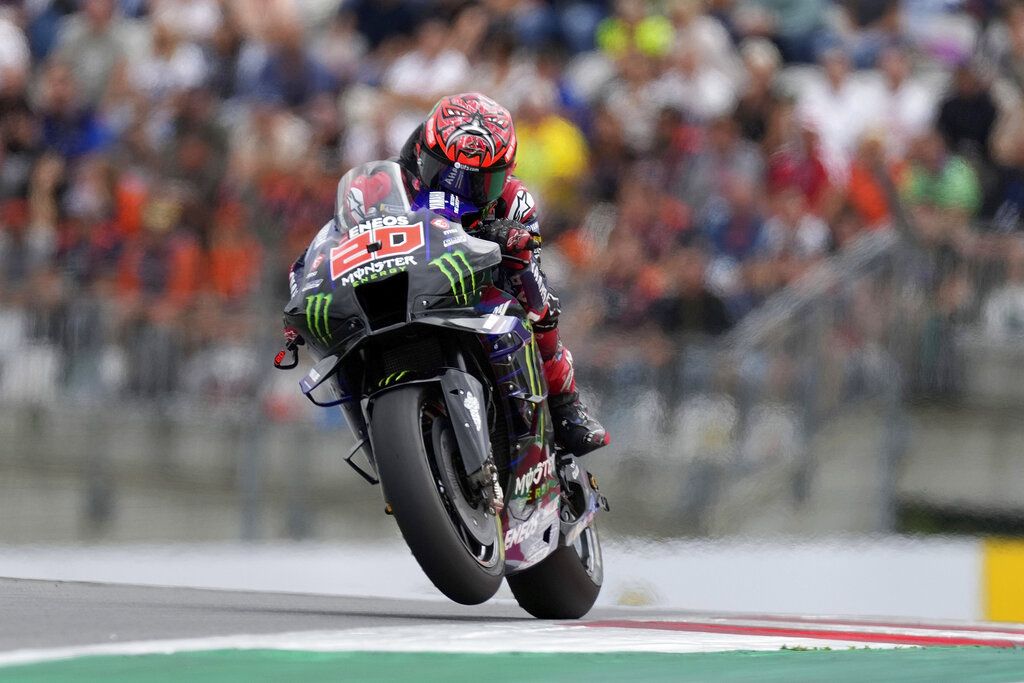France's Fabio Quartararo rides his Yamaha during the Moto GP race as part of the Austrian motorcycle Grand Prix at the Red Bull Ring in Spielberg, Austria, Sunday, Aug. 21, 2022. (AP Photo/Florian Schroetter)