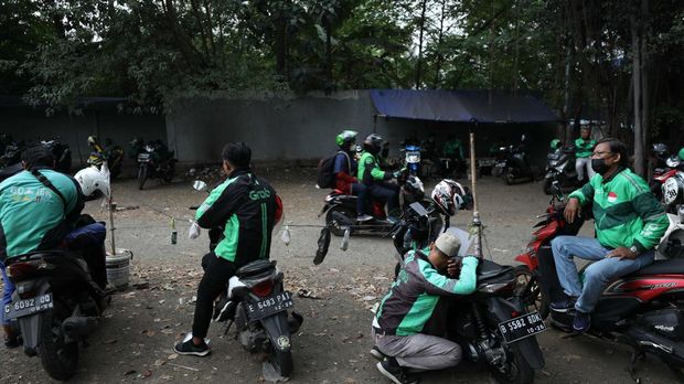 Ilustrasi aturan baru tarif ojek online. (CNBC Indonesia/Tri Susilo)