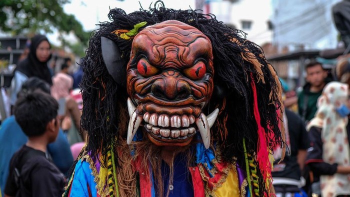 A student attend the 77th Independence Day of the Republic of Indonesia Carnival in Bangka Belitung, Indonesia on August 21, 2022. (Photo by Resha Juhari/NurPhoto via Getty Images)