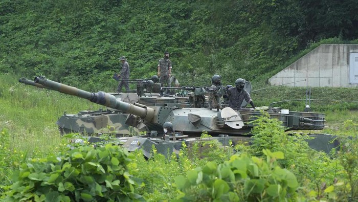 FILE - South Korean army soldiers prepare for an exercise at a training field in Paju, South Korea, near the border with North Korea, Wednesday, July 27, 2022. The United States and South Korea began their biggest combined military training in years Monday, Aug. 22, 2022, as they heighten their defense posture against the growing North Korean nuclear threat. (AP Photo/Ahn Young-joon, File)