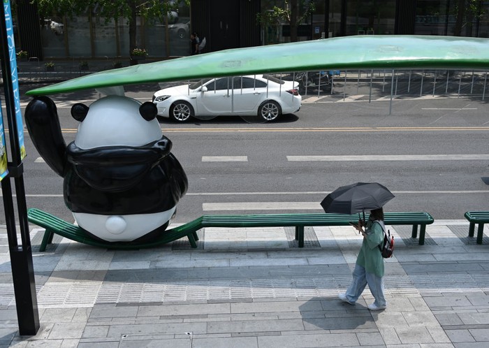 CHENGDU, CHINA - AUGUST 20: A giant panda-themed bus station is put into use at Taikoo Li complex on August 20, 2022 in Chengdu, Sichuan Province of China. (Photo by Chen Yusheng/VCG via Getty Images)