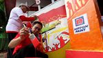 Pengecatan Puluhan Ribu Gapura Merah Putih Diganjar MURI