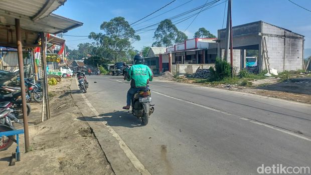Herna, driver ojol yang menerima orderan kuburkan mayat bayi.