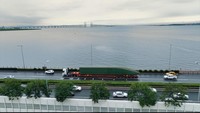Pengangkutan kereta menggunakan truk besar ke pelabuhan Qingdao, Tiongkok. Foto: Dok. KCIC