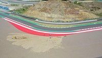 Track improvement adalah modifikasi Sirkuit yang wajib dilakukan ITDC-MGPA atas permintaan Federation Internationale de Motocyclisme (FIM). Kegiatan ini terdiri dari pengaspalan di lintasan Sirkuit, penambahan pelebaran run off di enam tikungan Sirkuit dan penambahan ban sebagai pelindung di beberapa area tembok pembatas Sirkuit.