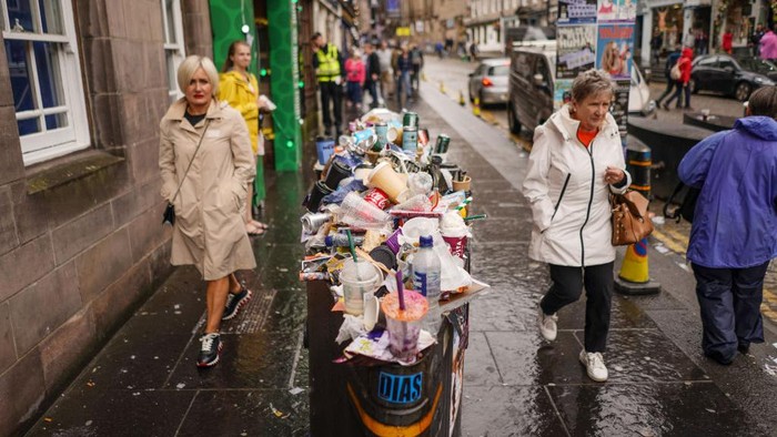 EDINBURGH, SCOTLAND - AUGUST 24: A large pile of rubbish bags is seen next to overflowing bins in the Grass Market on August 24, 2022 in Edinburgh, Scotland. Refuse collectors belonging to the Unite Union are striking across Scotland until August 30 in a row over pay. (Photo by Peter Summers/Getty Images)