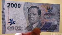Contoh selanjutnya uang baru pecahan Rp 2.000. Gambar watermarknya sama dengan gambar utama yakni Mohammad Hoesni Thamrin.
