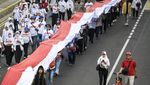 Wow! Bendera Merah Putih 1.700 Meter Membentang dari Monas-Bundaran HI