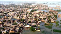 Pemandangan dari udara ini menunjukkan daerah pemukiman yang terendam banjir setelah hujan monsun lebat di provinsi Balochistan, Pakistan, Senin, (29/8/2022).