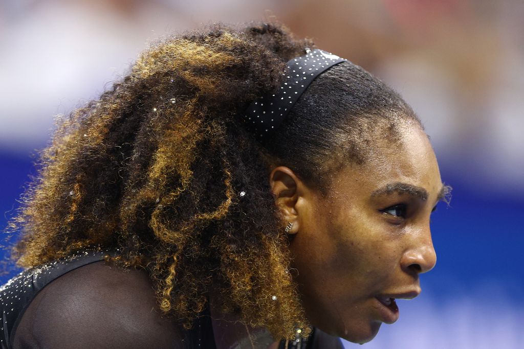 NEW YORK, NEW YORK - AUGUST 29: Serena Williams of the United States looks on against Danka Kovinic of Montenegro during the Women's Singles First Round on Day One of the 2022 US Open at USTA Billie Jean King National Tennis Center on August 29, 2022 in the Flushing neighborhood of the Queens borough of New York City. (Photo by Elsa/Getty Images)