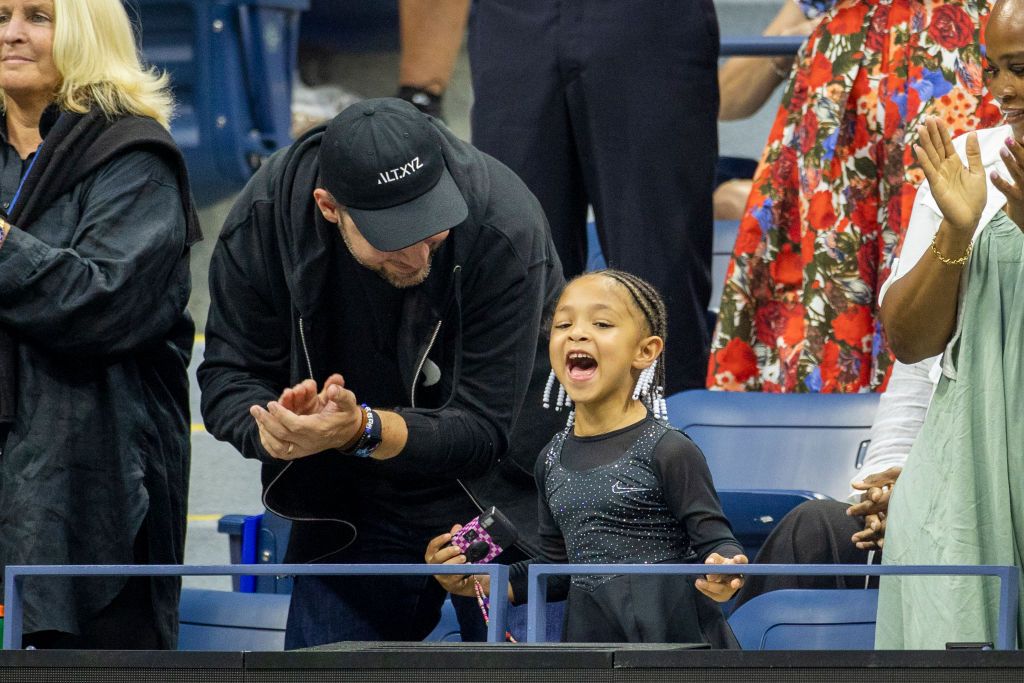 NEW YORK, USA, August 29:  Serena Williams's daughter Olympia and husband Alexis Ohanian take pictures and cheer as Serena Williams of the United States enters the arena for her match against Danka Kovinic of Montenegro on Arthur Ash Stadium in the Women's Singles round one match during the US Open Tennis Championship 2022 at the USTA National Tennis Centre on August 29th 2022 in Flushing, Queens, New York City.  (Photo by Tim Clayton/Corbis via Getty Images)