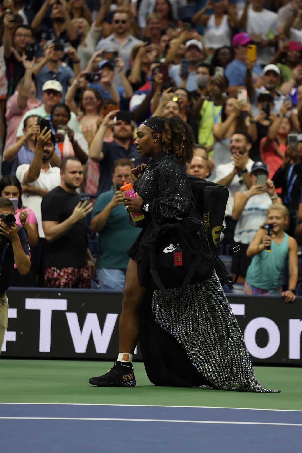NEW YORK, NEW YORK - AUGUST 29: Serena Williams of the United States walks onto the court prior to her Women's Singles First Round match against Danka Kovinic of Montenegro on Day One of the 2022 US Open at USTA Billie Jean King National Tennis Center on August 29, 2022 in the Flushing neighborhood of the Queens borough of New York City. (Photo by Al Bello/Getty Images)