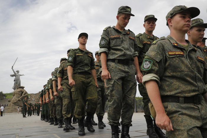 FILE - Russian army soldiers march during an action in support for the soldiers involved in the military operation in Ukraine, at the Mamaev Kurgan, a World War II memorial in Volgograd, Russia, July 11, 2022. Russian President Vladimir Putin has on Thursday, Aug. 25 ordered the Russian military to increase the size of the countrys armed forces by 137,000 amid Moscow’s military action in Ukraine. (AP Photo/Alexandr Kulikov, file)