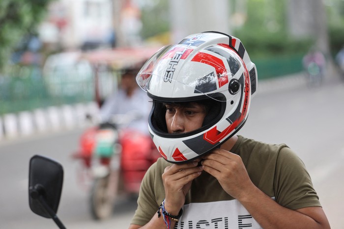 Motorcycle helmets manufactured by Shellios Technolabs, that they claim is fitted with filters and a fan at the back of the helmet, is pictured at the assembling unit of its factory in an industrial area, in New Delhi, India, August 23, 2022. REUTERS/Anushree Fadnavis