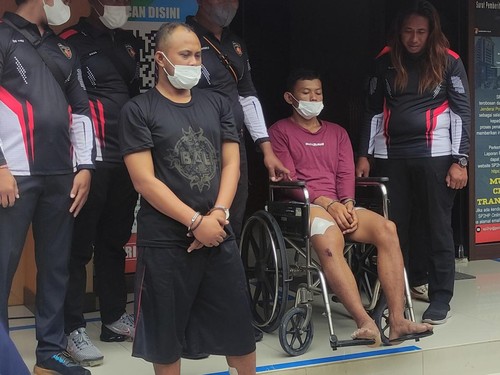 Tersangka NSP dan RA alias RN saat diamankan di Mapolda Bali