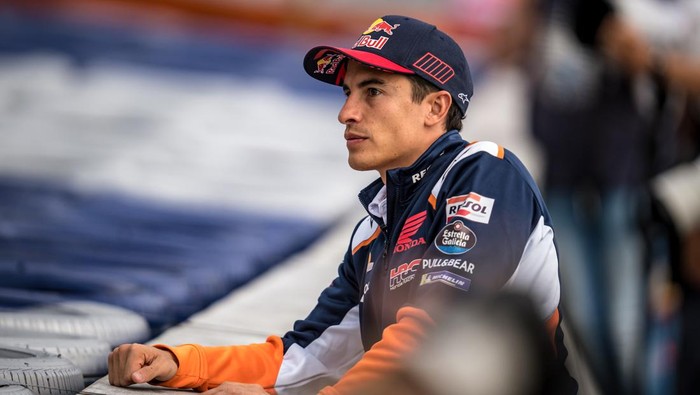 SPIELBERG, AUSTRIA - AUGUST 19: Marc Marquez of Spain and Repsol Honda Team watches the practice from the service road during the free practice of the CryptoDATA MotoGP of Austria at Red Bull Ring on August 19, 2022 in Spielberg, Austria. (Photo by Steve Wobser/Getty Images)