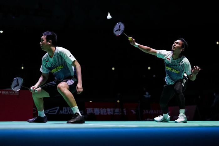 OSAKA, JAPAN - AUGUST 31: Mohammad Ahsan (R) and Hendra Setiawan of Indonesia compete in the Mens Doubles First Round match against Kang Min Hyuk and Seo Seung Jae of Korea during day two of Daihatsu Yonex Japan Open at Maruzen Intec Arena Osaka on August 31, 2022 in Osaka, Japan. (Photo by Shi Tang/Getty Images)