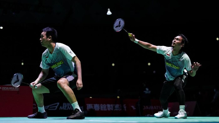 OSAKA, JAPAN - AUGUST 31: Mohammad Ahsan (R) and Hendra Setiawan of Indonesia compete in the Mens Doubles First Round match against Kang Min Hyuk and Seo Seung Jae of Korea during day two of Daihatsu Yonex Japan Open at Maruzen Intec Arena Osaka on August 31, 2022 in Osaka, Japan. (Photo by Shi Tang/Getty Images)