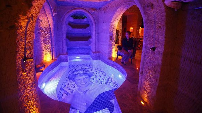 NEVSEHIR, TURKIYE - AUGUST 31: An interior view of a rock-cut hotel's room which is named as Princess Diana in Nevsehir, Turkiye on August 31, 2022. Hotel's room which has a pool with a photograph of Princess Diana made from mosaic, attracts the attention of domestic and foreign tourists. (Photo by Sercan Kucuksahin/Anadolu Agency via Getty Images)