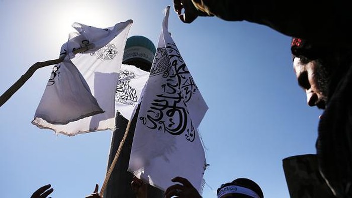 KABUL, AFGHANISTAN - AUGUST 31: Members of Taliban led government, as well as many Afghan men participate in celebrations marking the 1st anniversary of the US-led troops' withdrawal from the country in Kabul, Afghanistan on August 31, 2022. (Photo by Bilal Guler/Anadolu Agency via Getty Images)