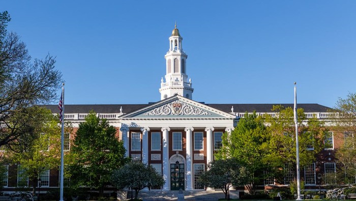 Boston, Massachusetts, USA - May 13, 2021: Baker Library on the Harvard Business School (HBS) campus. Dedicated in 1927 and named for George F. Baker, the benefactor who funded HBSs original campus. It is the largest business library in the world.