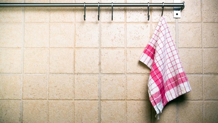 Fetish Serbet Kitchen utensils, cloth hanging alone on wall.
