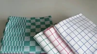 Salah satu motif serbet jadul yang banyak diincar pemilik fetish serbet adalah motif kotak-kotak kecil dengan warna dasar biru, merah muda, dan hijau muda. Foto: Pool/Site