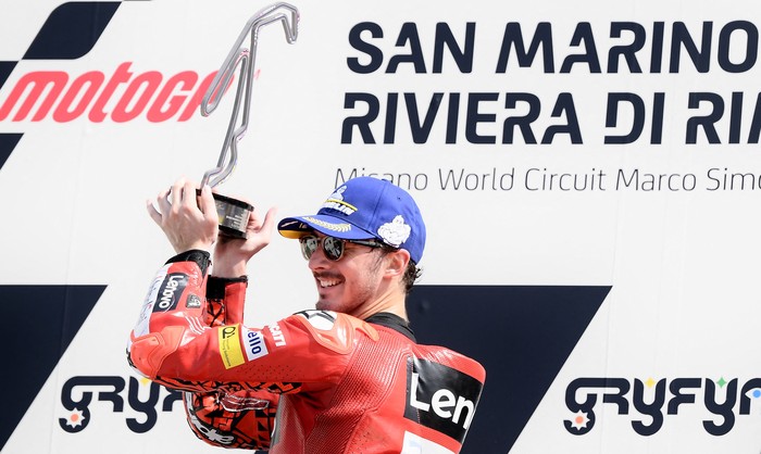 Ducati Lenovos Italian rider Francesco Bagnaia celebrates victory on the podium after the San Marino MotoGP race at the Misano World Circuit Marco-Simoncelli in Misano Adriatico on September 4, 2022. (Photo by Filippo MONTEFORTE / AFP) (Photo by FILIPPO MONTEFORTE/AFP via Getty Images)