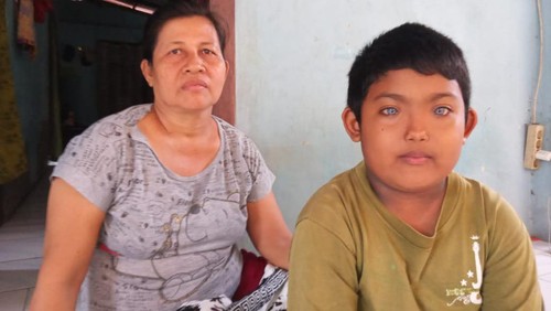 Ketut Adi Ketut Adi Putra (9) dan Ketut Suryani (Ibu Kandung Ketut Adi Putra).