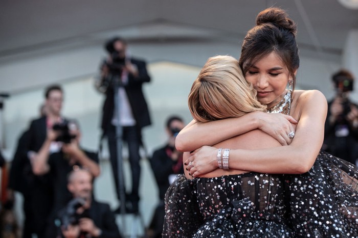 VENICE, ITALY - SEPTEMBER 05: Gemma Chan greets Florence Pugh during  the 