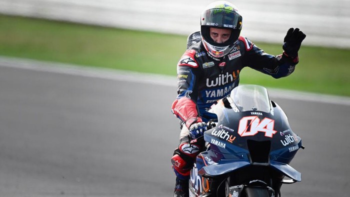 MISANO ADRIATICO, ITALY - SEPTEMBER 04: Andrea Dovizioso of Italy and WithU Yamaha RNF MotoGP Team greets the fans and celebrates at the end of the last his MotoGP race during the MotoGP Of San Marino - Race at Misano World Circuit on September 04, 2022 in Misano Adriatico, Italy. (Photo by Mirco Lazzari gp/Getty Images)