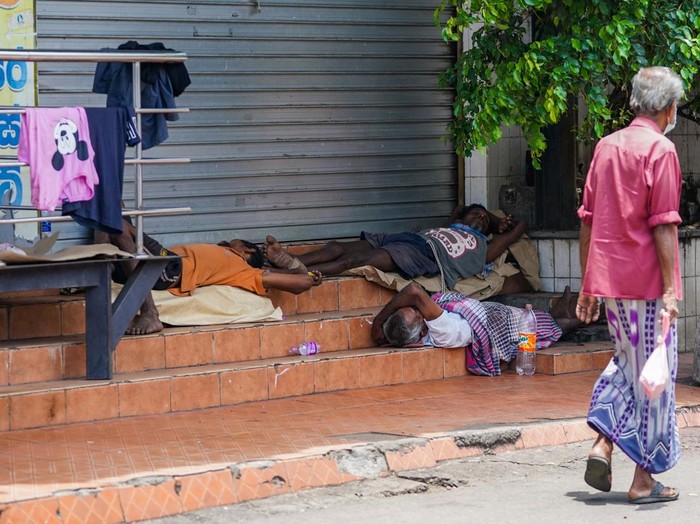 Old man walk in public road on Colombo, sri lanka. September 03, 2022. Sri Lanka is currently facing a political and economic crisis. (Photo by Thilina Kaluthotage/NurPhoto via Getty Images)