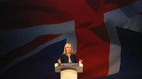 Pada tahun 2019 ketika Boris Johnson menjadi Perdana Menteri, Truss ditempatkan sebagai Menteri Perdagangan Internasional, pekerjaan yang berarti kesempatan bertemu dengan para pemimpin politik dan bisnis global untuk mempromosikan kepentingan dagang Inggris. (Christopher Furlong/Getty Images)