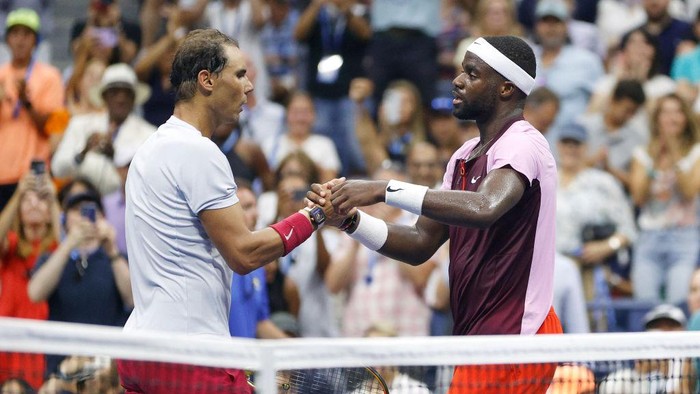 NEW YORK, NEW YORK - SEPTEMBER 05: Frances Tiafoe of the United States shakes hands after defeating Rafael Nadal of Spain during their Men’s Singles Fourth Round match on Day Eight of the 2022 US Open at USTA Billie Jean King National Tennis Center on September 05, 2022 in the Flushing neighborhood of the Queens borough of New York City. (Photo by Sarah Stier/Getty Images)