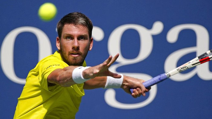 Cameron Norrie, of Great Britain, eyes the ball on a return to Andrey Rublev, of Russia, during the fourth round of the U.S. Open tennis championships, Monday, Sept. 5, 2022, in New York. (AP Photo/Eduardo Munoz Alvarez)