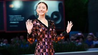 Senyum cantik Fumino Kimura. (Foto: AFP via Getty Images/ANDREAS SOLARO)